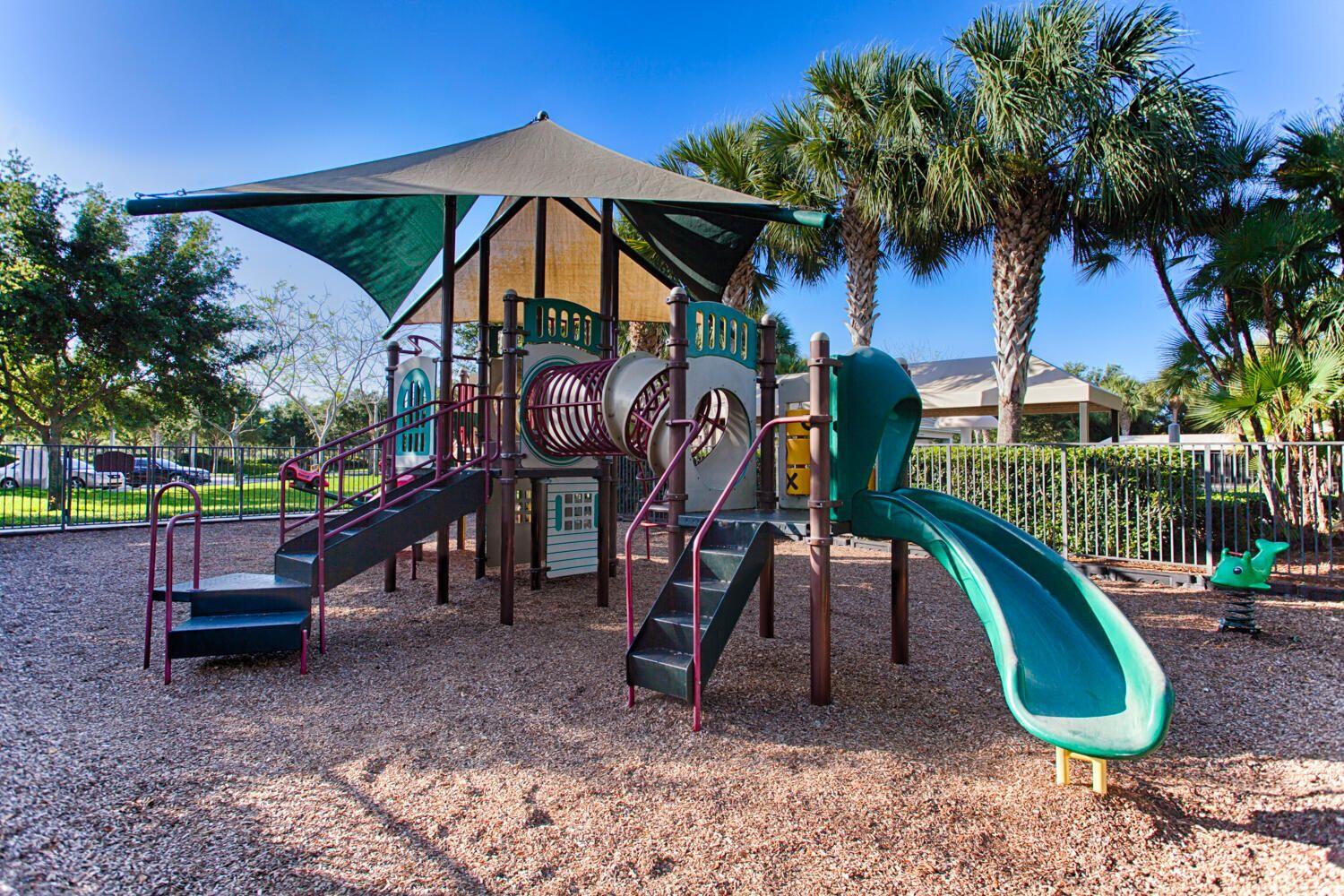 7559 Spatterdock Drive Boynton Beach, FL 33437 - Photo 27 of 33 a view of outdoor space swimming pool and outdoor seating