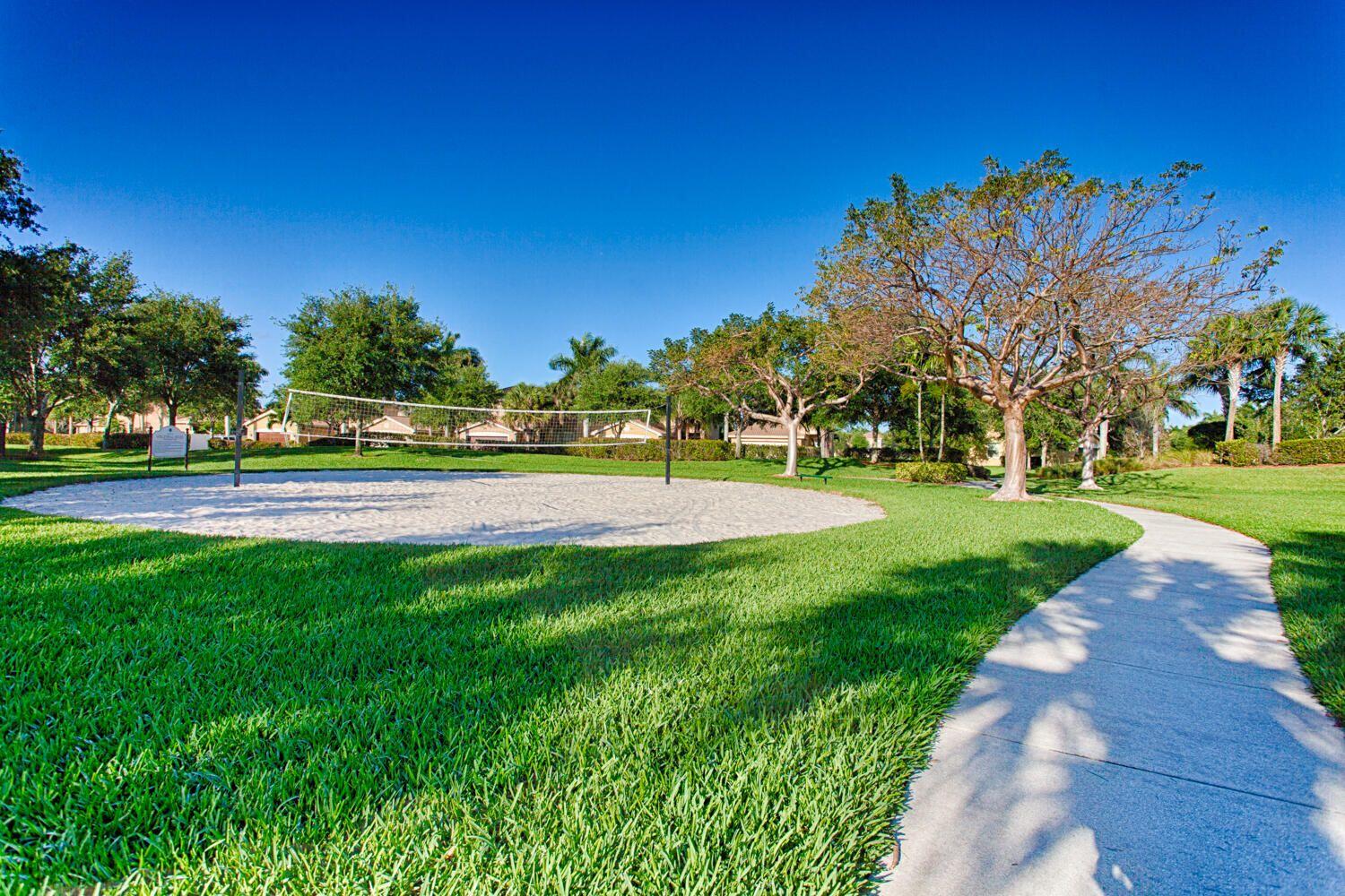 7559 Spatterdock Drive Boynton Beach, FL 33437 - Photo 31 of 33 a view of a park with large trees