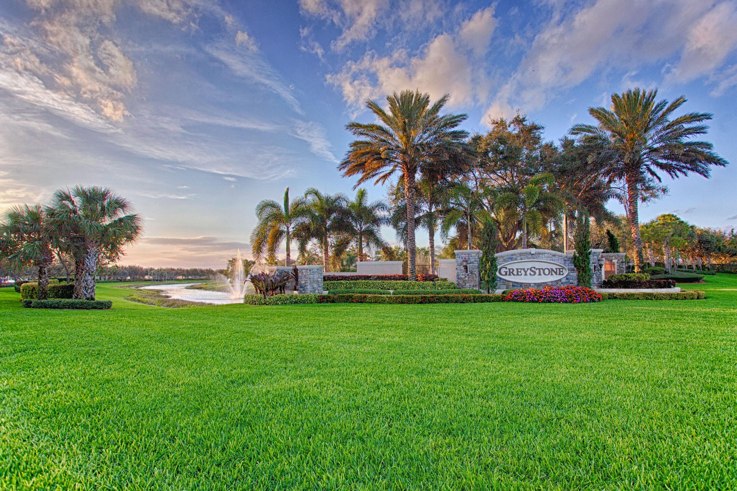 7559 Spatterdock Drive Boynton Beach, FL 33437 - Photo 33 of 33 a house with palm tree in front of it