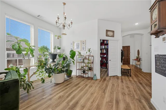 a view of a workspace with bookshelf