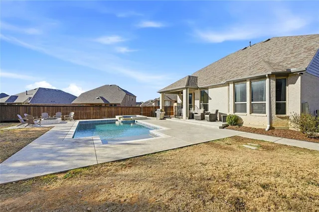 a view of house with patio