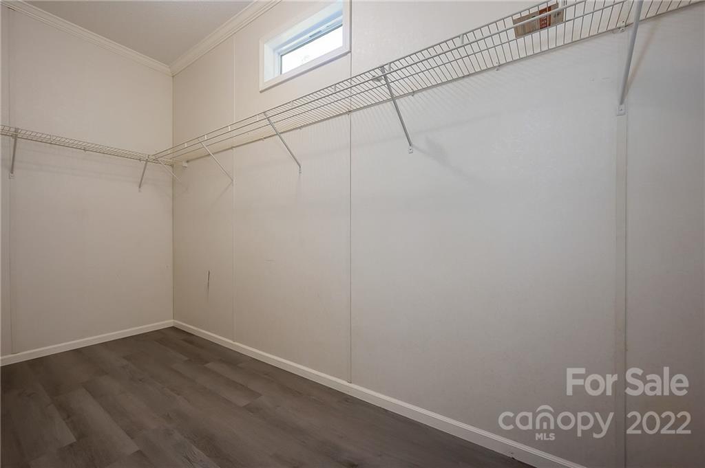 6410 Big Level Road Mill Spring, NC 28756 - Photo 22 of 32 a view of a room with racks on the wall