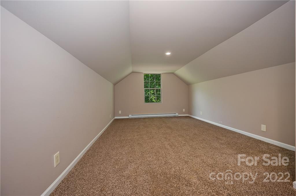 6410 Big Level Road Mill Spring, NC 28756 - Photo 27 of 32 an empty room with windows