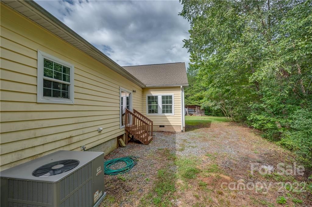 6410 Big Level Road Mill Spring, NC 28756 - Photo 3 of 32 a view of backyard of the house