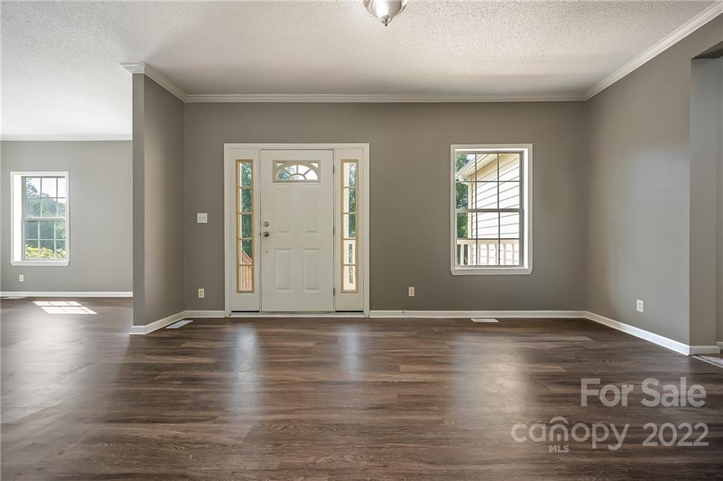 6410 Big Level Road Mill Spring, NC 28756 - Photo 6 of 32 an empty room with window