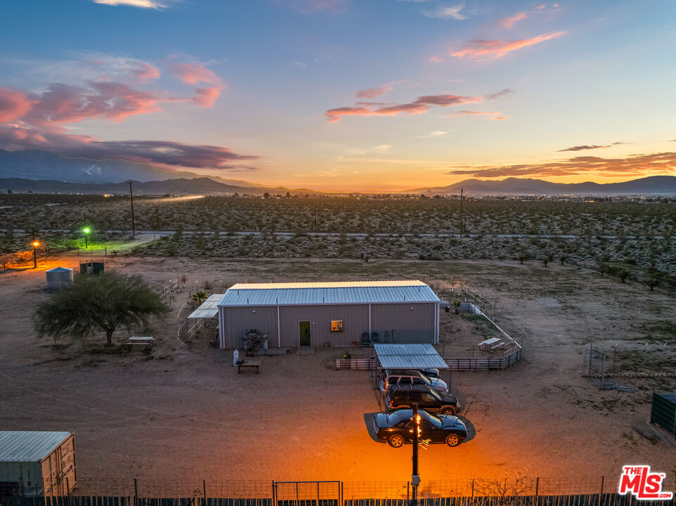9025 Camp Rock Road Lucerne Valley, CA 92356 - Photo 16 of 54 a view of a terrace with a garden
