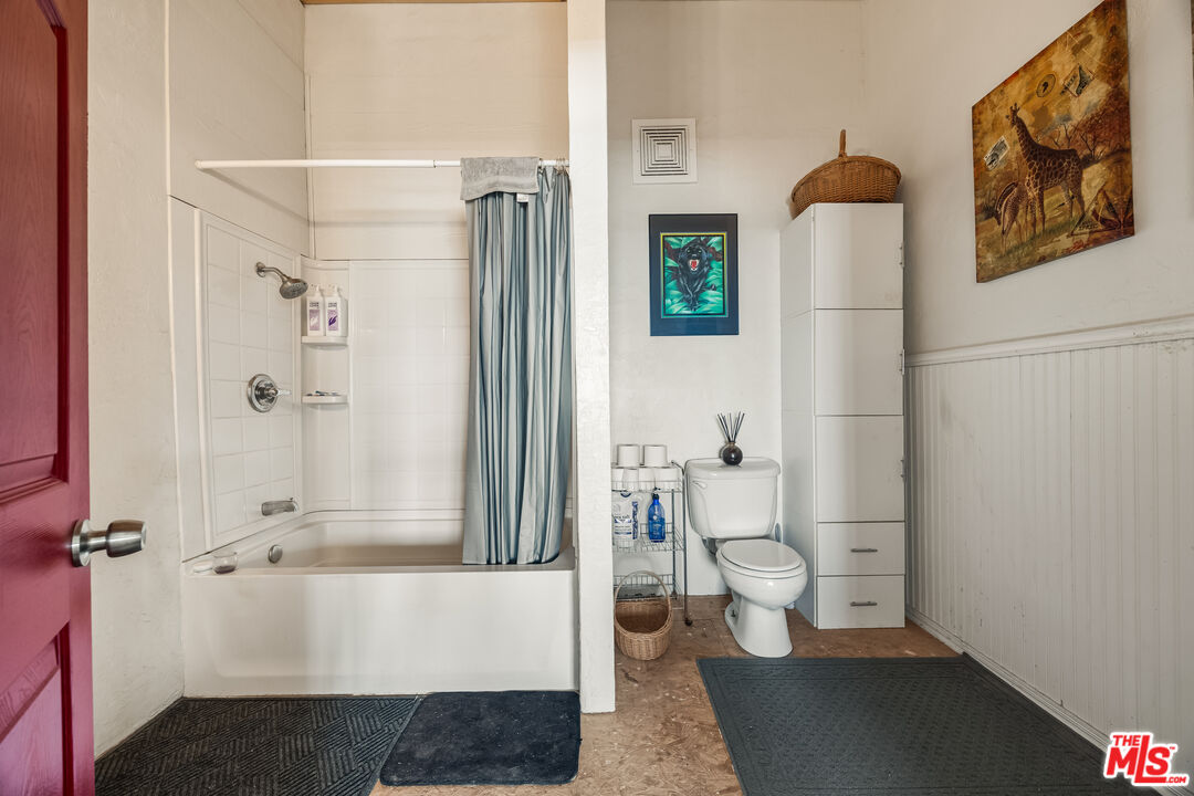 9025 Camp Rock Road Lucerne Valley, CA 92356 - Photo 36 of 54 a bathroom with a shower and a toilet