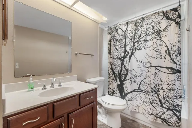 a view of a balcony with wooden floor