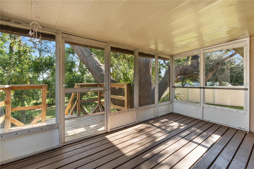 6007 Waycross Drive Spring Hill, FL 34606 - Photo 23 of 33 a view of a balcony with wooden floor