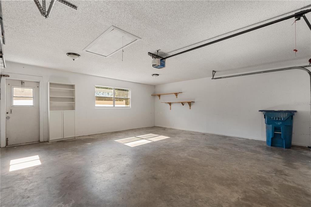 6007 Waycross Drive Spring Hill, FL 34606 - Photo 26 of 33 a view of a livingroom with a ceiling fan and window