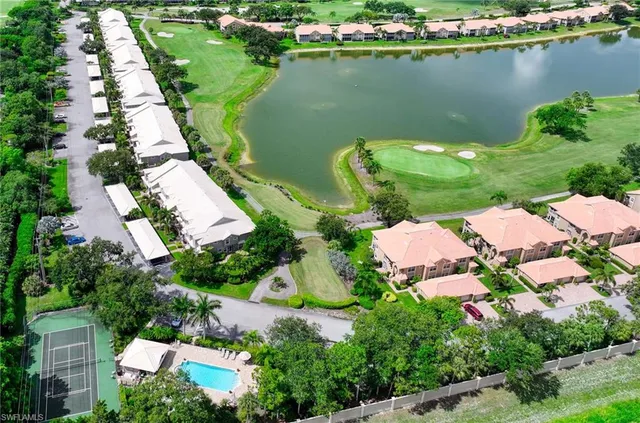 an aerial view of lake residential houses with outdoor space and lake view
