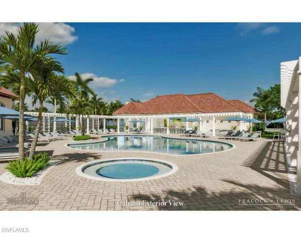 a view of a house with swimming pool and sitting area