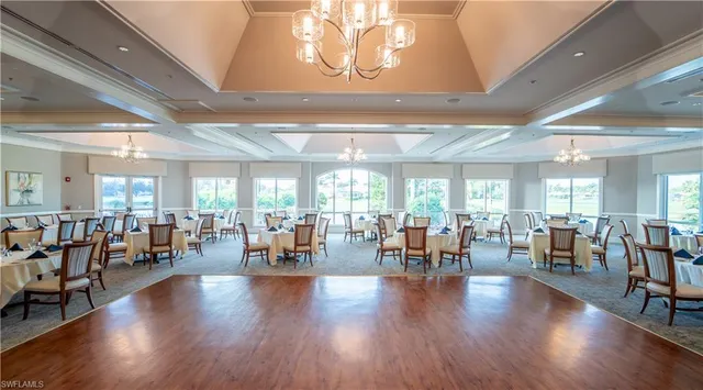a room with gym equipment and a large window