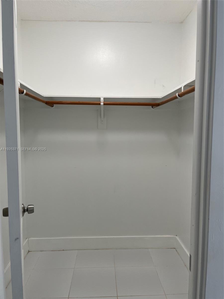 3100 North Palm Aire Drive, Unit 104 Pompano Beach, FL 33069 - Photo 12 of 20 a view of closet