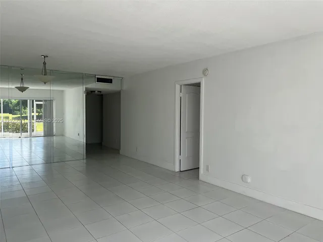 an empty room with a natural light