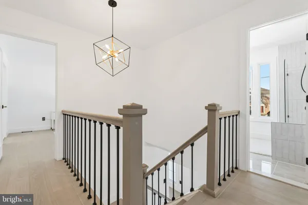 a view of a hallway with windows