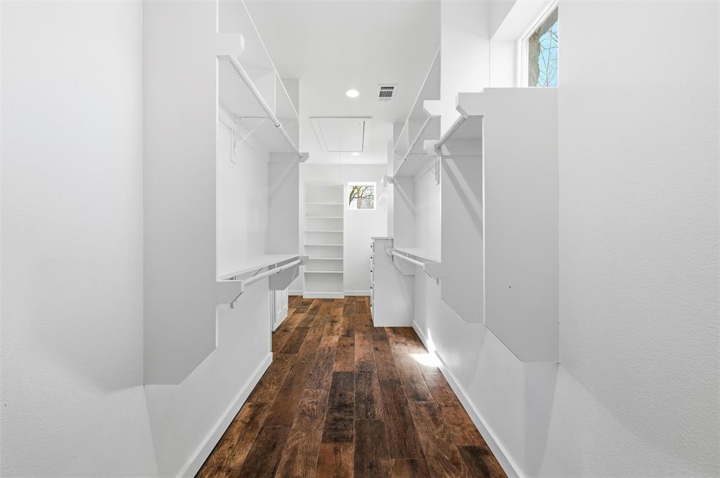 1845 Summer Lane Keller, TX 76262 - Photo 17 of 28 a view of a hallway with wooden floor and staircase