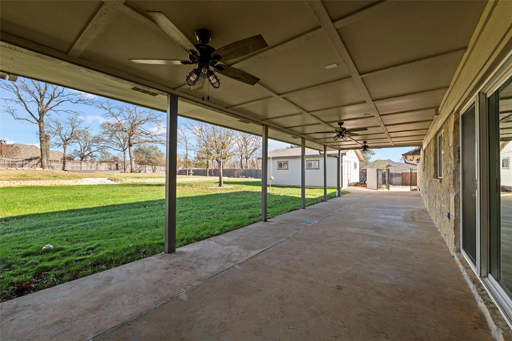 1845 Summer Lane Keller, TX 76262 - Photo 23 of 28 a view of a house with backyard and porch