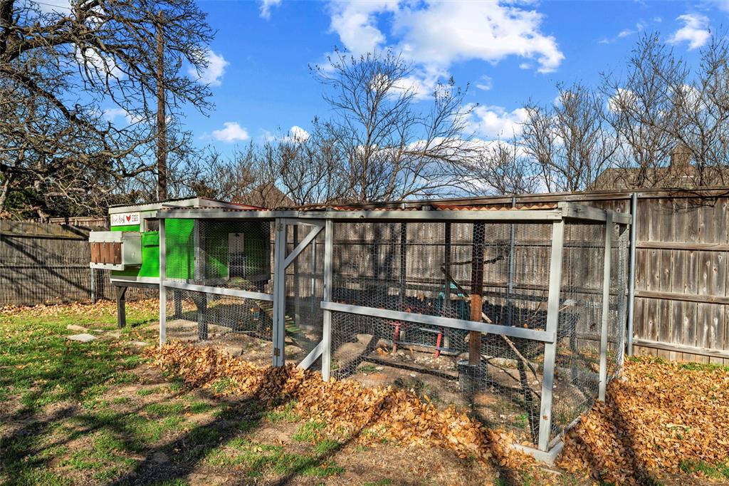 1845 Summer Lane Keller, TX 76262 - Photo 26 of 28 a view of a chairs and table in backyard