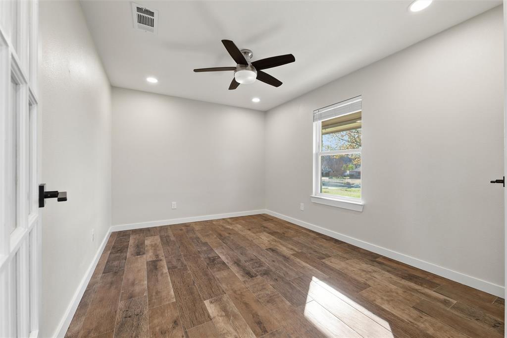 1845 Summer Lane Keller, TX 76262 - Photo 4 of 28 wooden floor in an empty room with a window