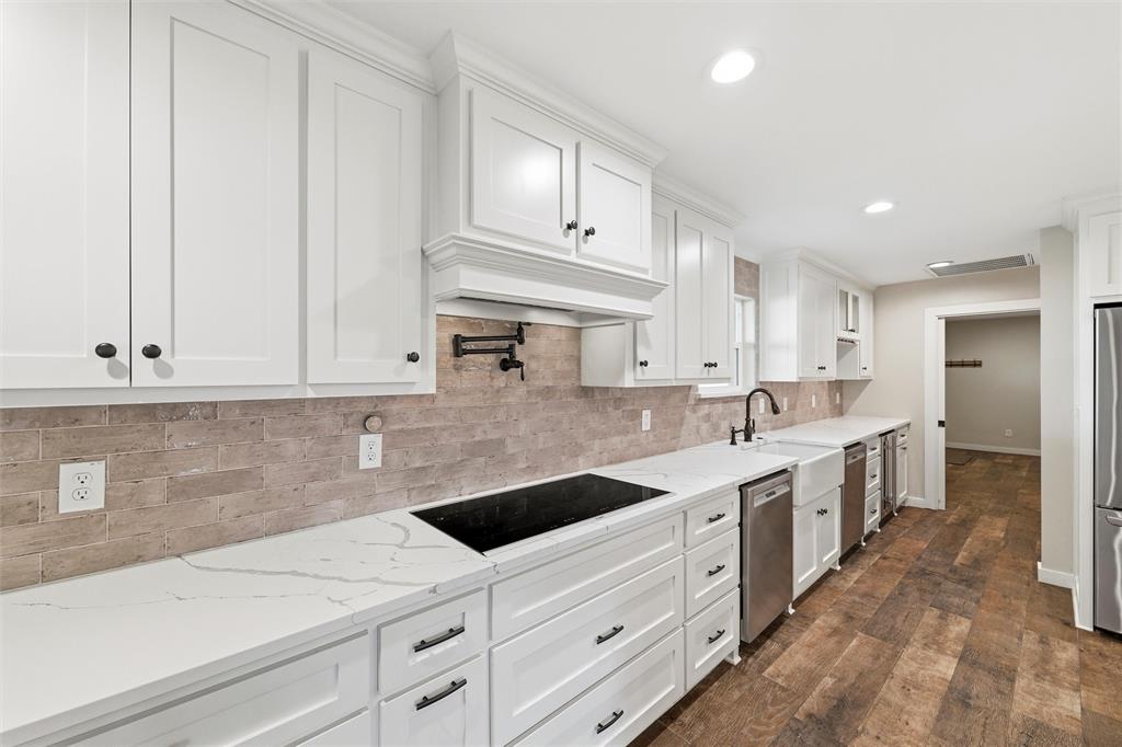 1845 Summer Lane Keller, TX 76262 - Photo 10 of 28 a kitchen with white cabinets