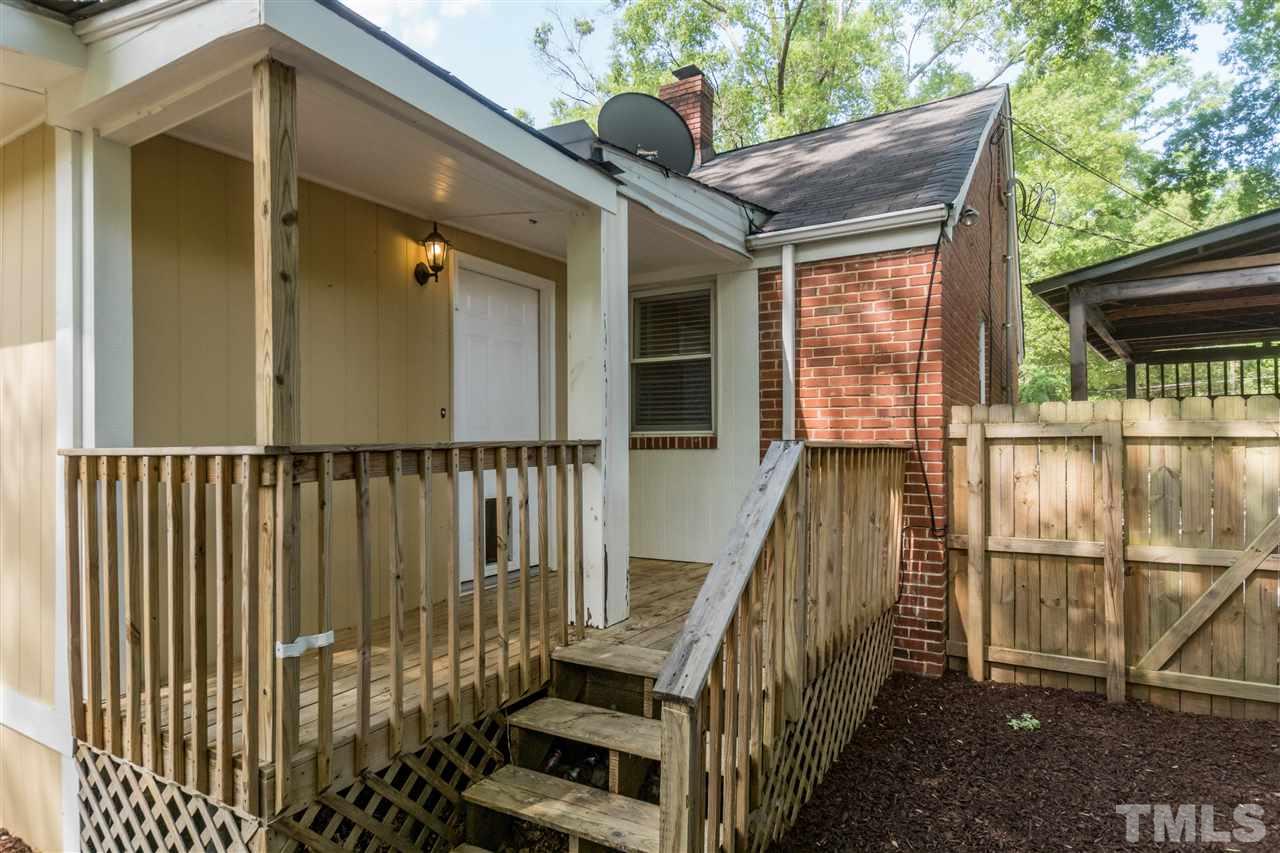 600 North King Charles Road Raleigh, NC 27610 - Photo 20 of 24 Exit from the family room onto this back porch.