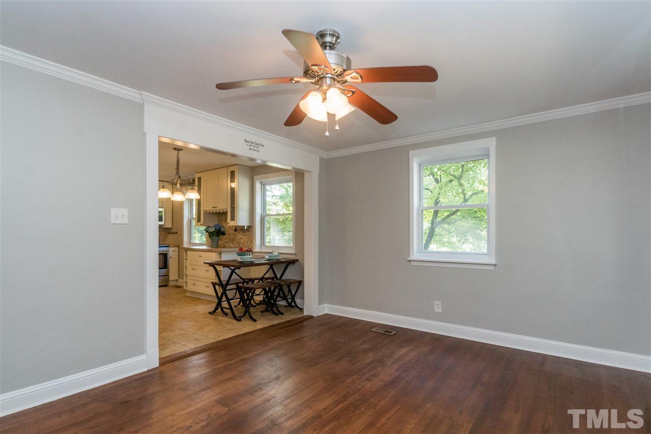 600 North King Charles Road Raleigh, NC 27610 - Photo 4 of 24 Living room open to the kitchen