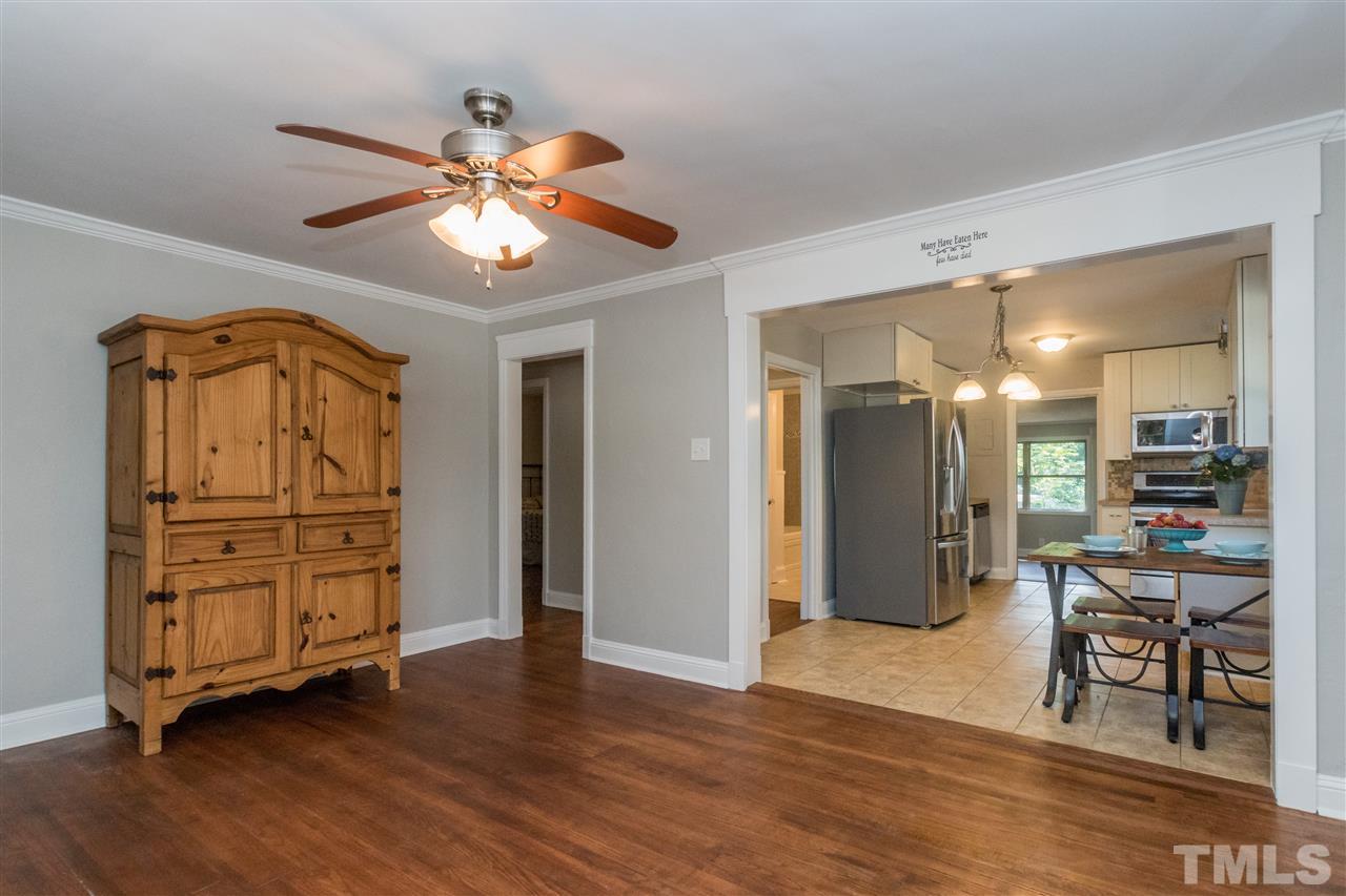 600 North King Charles Road Raleigh, NC 27610 - Photo 7 of 24 Kitchen is open to living room