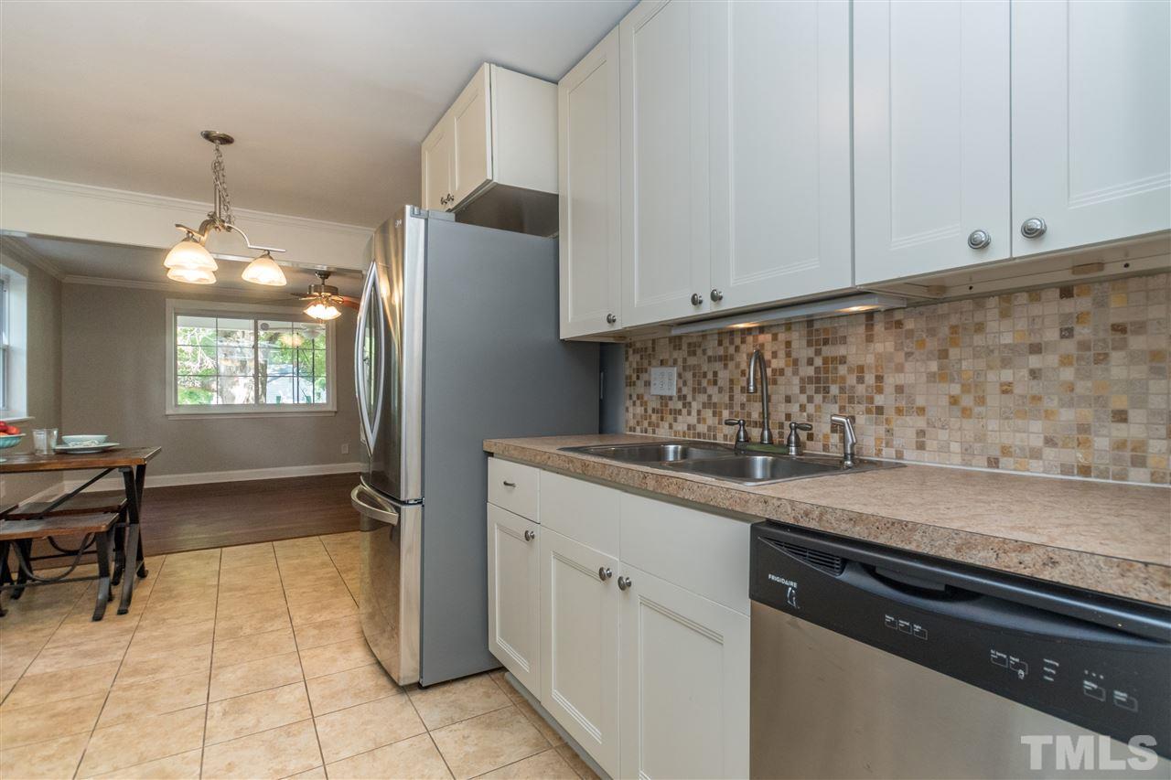 600 North King Charles Road Raleigh, NC 27610 - Photo 10 of 24 Lots of counter space and under counter lighting.