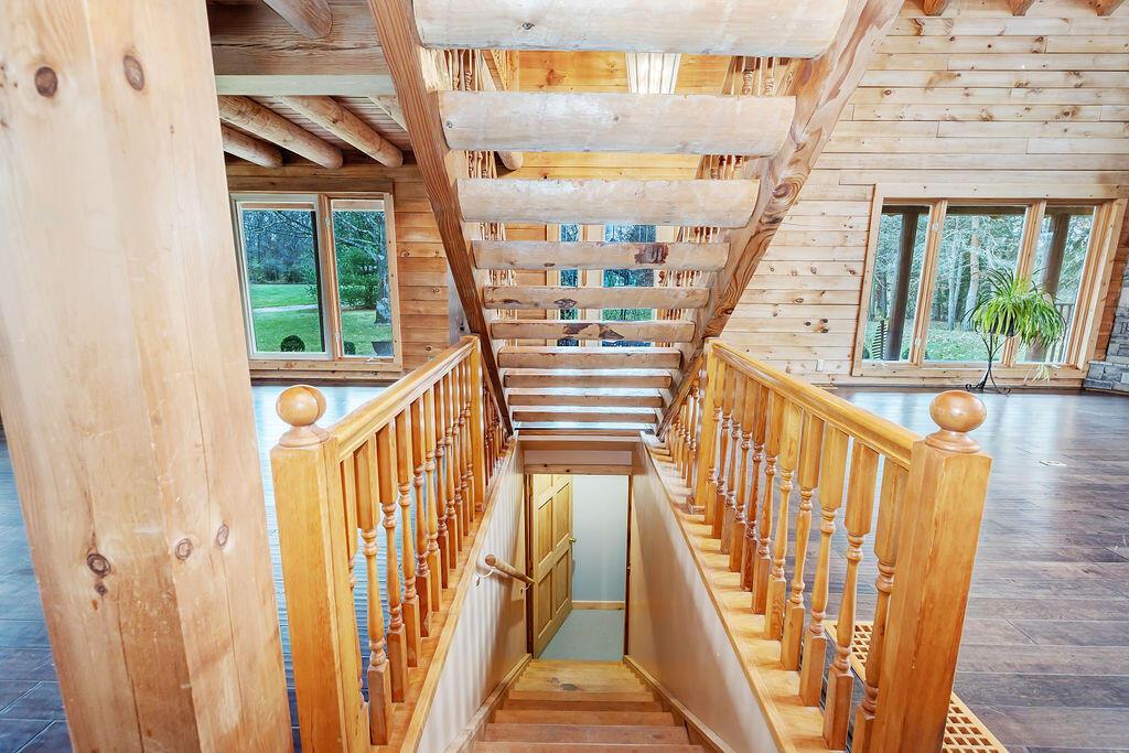 13275 Pickerington Road Northwest Pickerington, OH 43147 - Photo 58 of 76 OPEN STAIRCASE TO WALK-OUT LOWER LEVEL