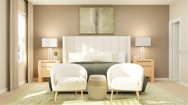 a living room with furniture and a lamp