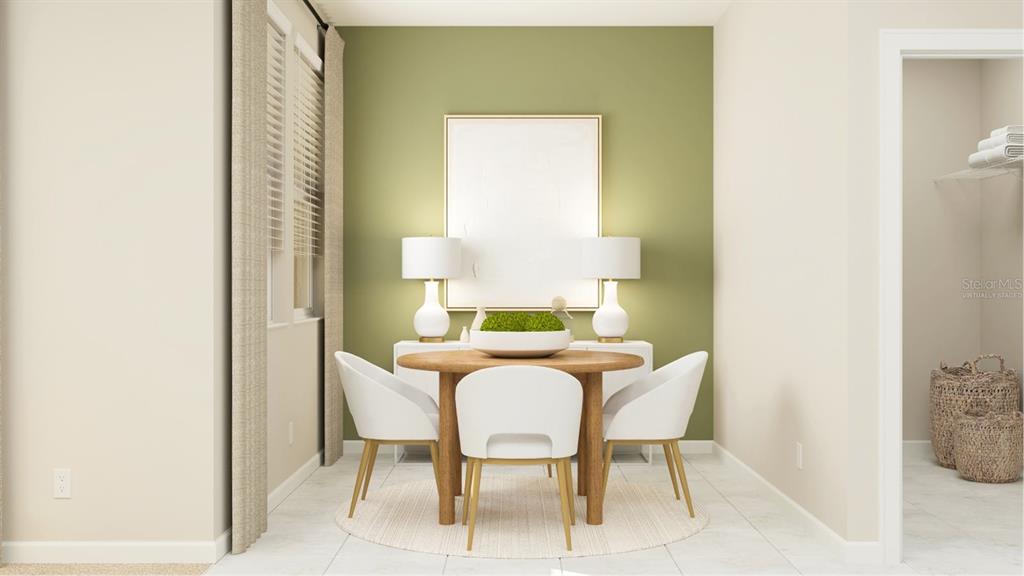 3261 Zuni Road St. Cloud, FL 34771 - Photo 4 of 21 a dining room with furniture and a window