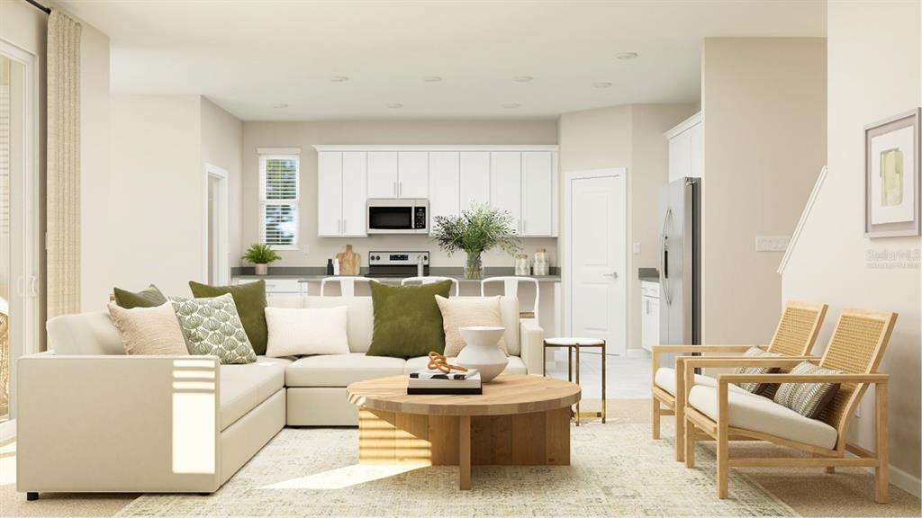 3261 Zuni Road St. Cloud, FL 34771 - Photo 7 of 21 a living room with furniture and a flat screen tv