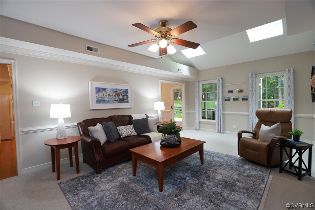 6314 Walnut Bend Drive Midlothian, VA 23112 - Photo 15 of 50 a living room with furniture a chandelier and a window