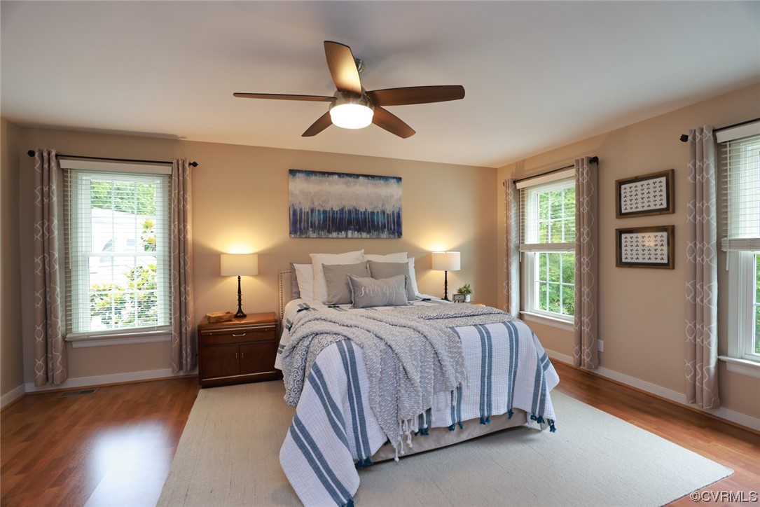 6314 Walnut Bend Drive Midlothian, VA 23112 - Photo 19 of 50 a bedroom with a large bed and a window