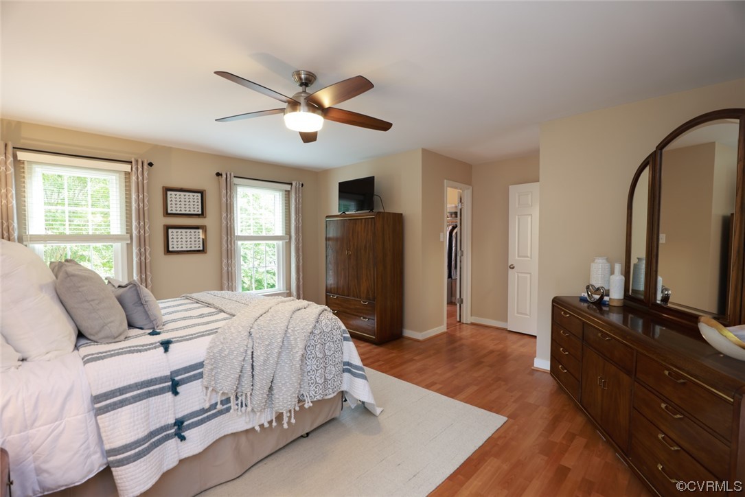 6314 Walnut Bend Drive Midlothian, VA 23112 - Photo 20 of 50 a bedroom with a bed dresser and a window