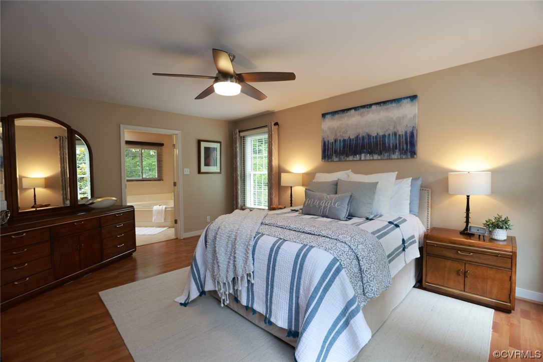 6314 Walnut Bend Drive Midlothian, VA 23112 - Photo 21 of 50 a bedroom with a bed and a mirror on dresser