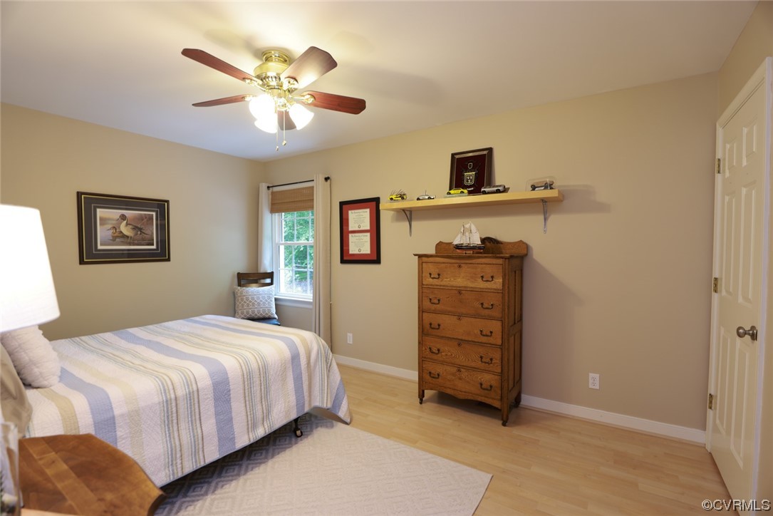 6314 Walnut Bend Drive Midlothian, VA 23112 - Photo 25 of 50 a bedroom with a bed and a ceiling fan