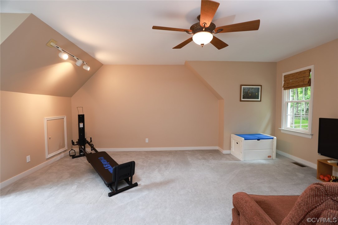 6314 Walnut Bend Drive Midlothian, VA 23112 - Photo 29 of 50 a room with gym equipment and a flat screen tv