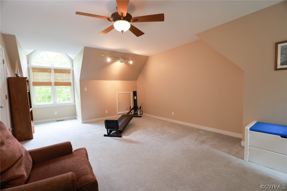 6314 Walnut Bend Drive Midlothian, VA 23112 - Photo 30 of 50 a living room with furniture a flat screen tv and a window