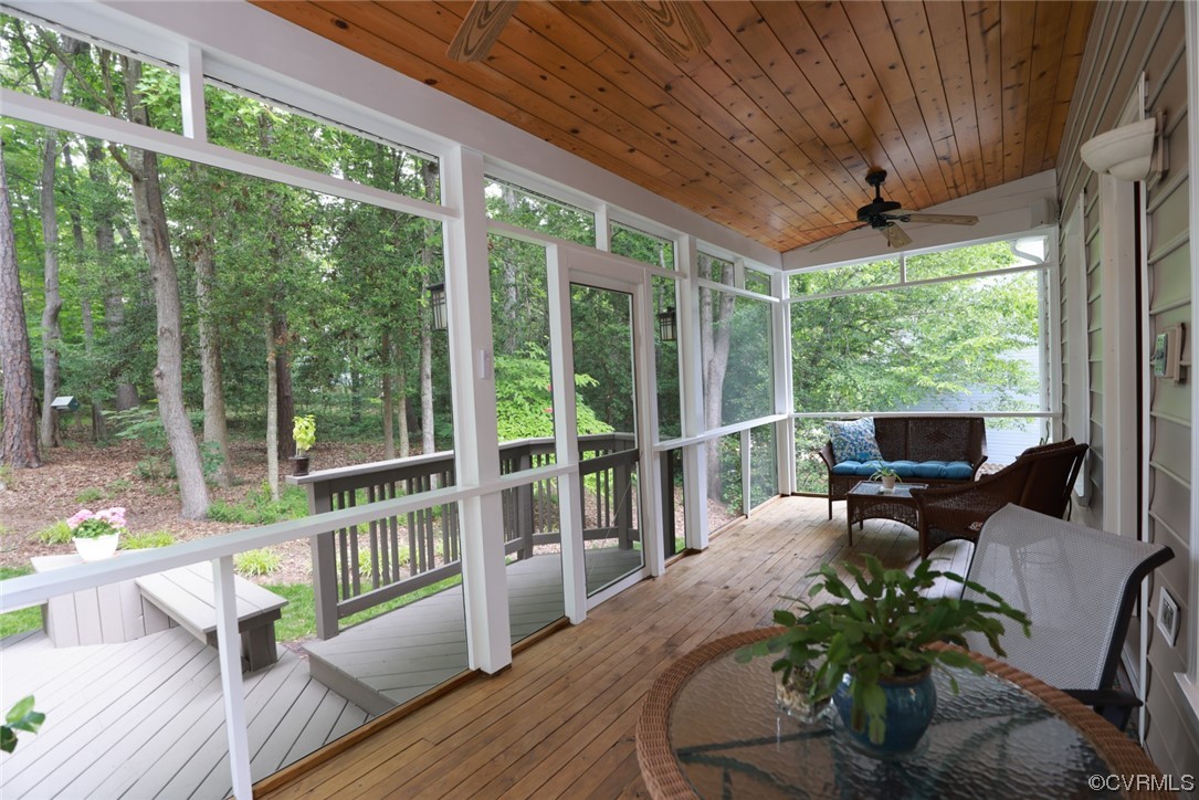 6314 Walnut Bend Drive Midlothian, VA 23112 - Photo 31 of 50 a balcony with furniture and wooden floor