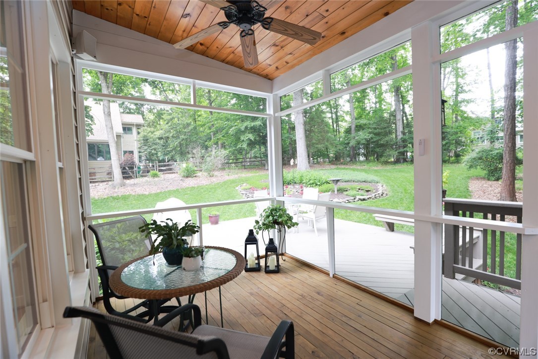 6314 Walnut Bend Drive Midlothian, VA 23112 - Photo 32 of 50 a view of a dining room with furniture window and wooden floor