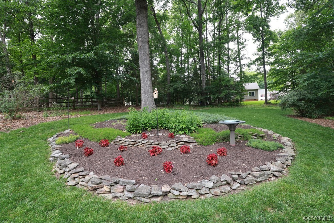 6314 Walnut Bend Drive Midlothian, VA 23112 - Photo 41 of 50 a view of a backyard with a garden