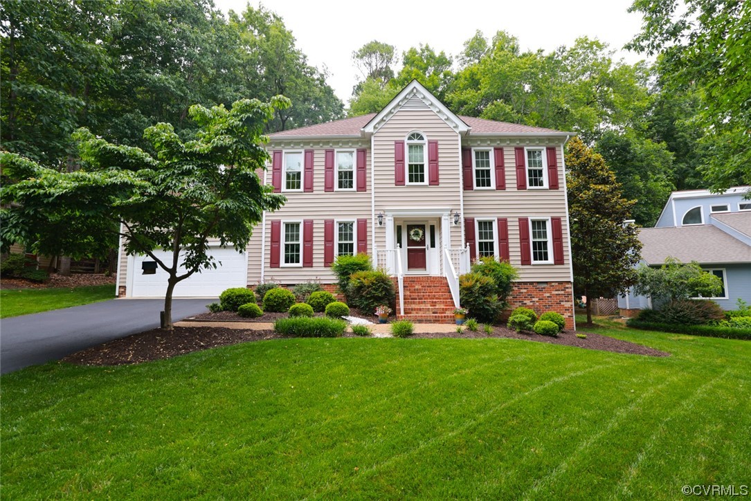 6314 Walnut Bend Drive Midlothian, VA 23112 - Photo 50 of 50 a front view of a house with a yard and green space
