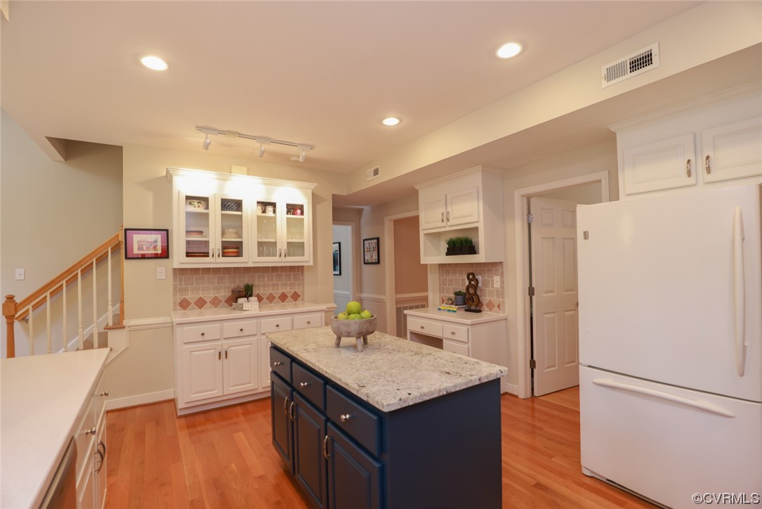 6314 Walnut Bend Drive Midlothian, VA 23112 - Photo 9 of 50 a kitchen with a refrigerator a sink and a stove top oven