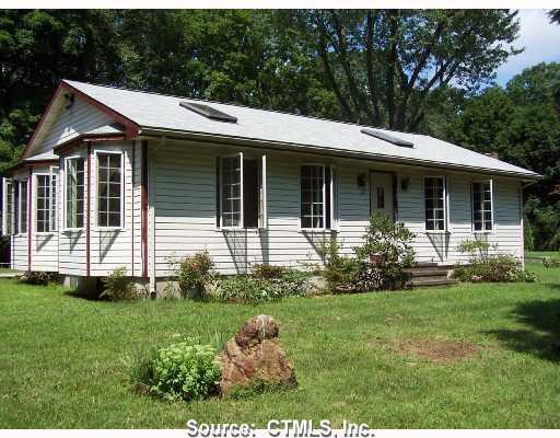 25 Glenwood Road Clinton, CT 06413 - Photo 1 of 1 a view of a house with a yard and sitting area