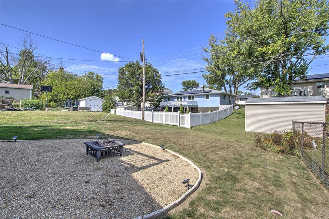 98 Ridgeway Drive Decatur, IL 62521 - Photo 27 of 31 a view of a house with backyard and sitting area