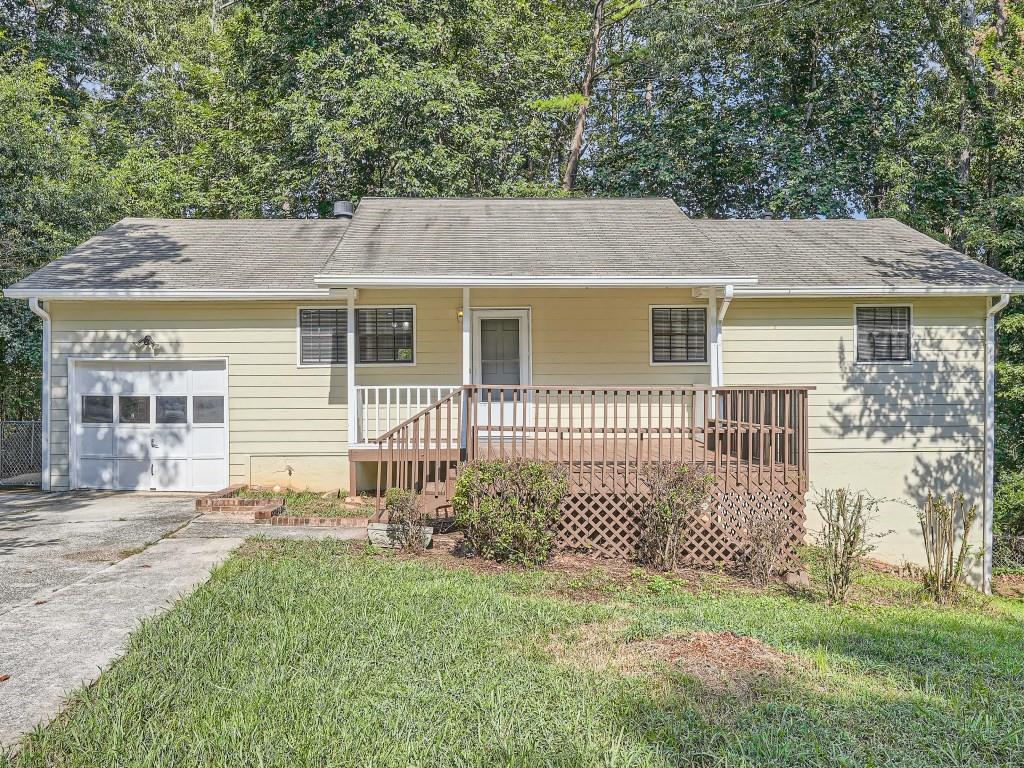 3988 Valley Brook Road Snellville, GA 30039 - Photo 1 of 1 front view of a house with a yard