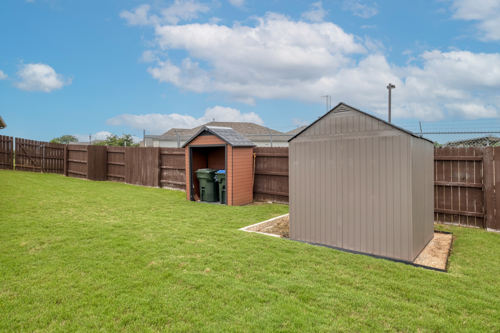 1000 Bright Star Cove Georgetown, TX 78628 - Photo 6 of 40 a view of a house with a yard and sitting area