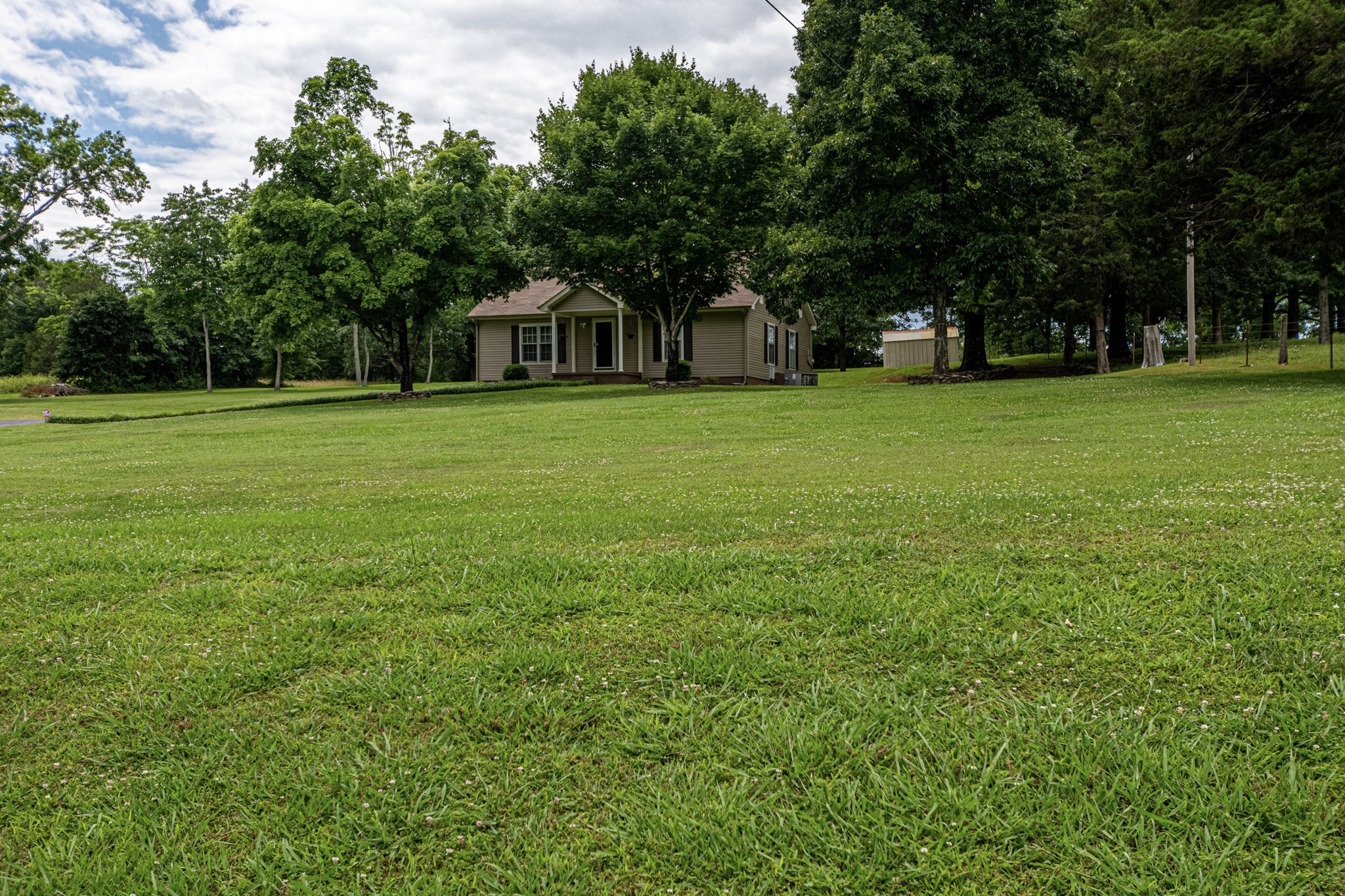 1921 Fiducia Road Pulaski, TN 38478 - Photo 6 of 45 a front view of house with yard and green space